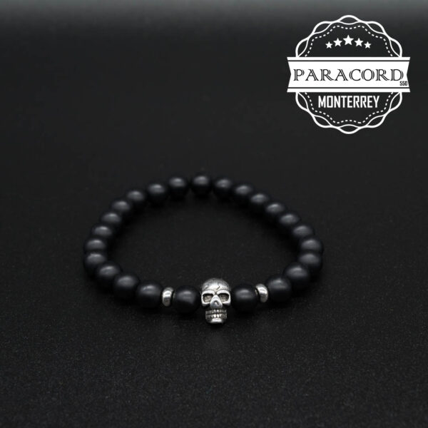 PULSERA ONIX MATE 8MM CON CUENTA DE CALAVERA DE ACERO INOX